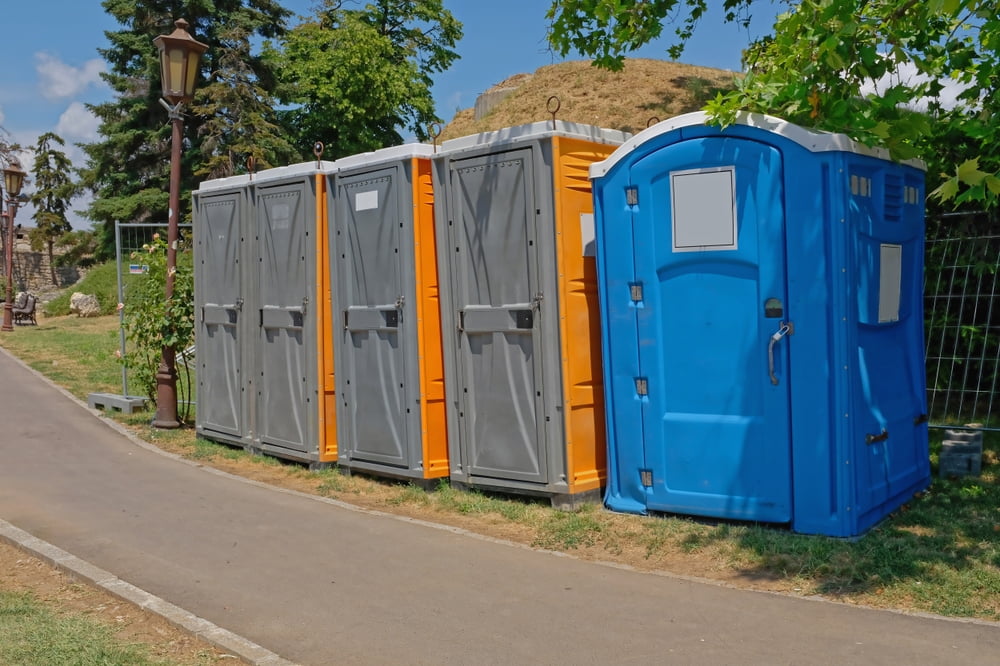 blue and green porta potty